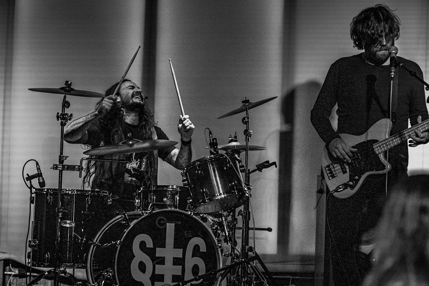 Black and white image of rock band Stereo Christ, showing Keith Moucha on drums and vocals and Douglas Gluth on bass guitar.
